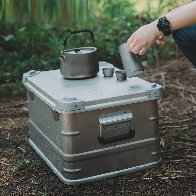 Field green aluminium alloy outdoor storage box with dimensions 58cm by 38cm by 28cm.