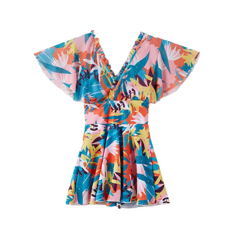 Women's cover belly one-piece swimsuit with colourful printed pattern in polyester fabric