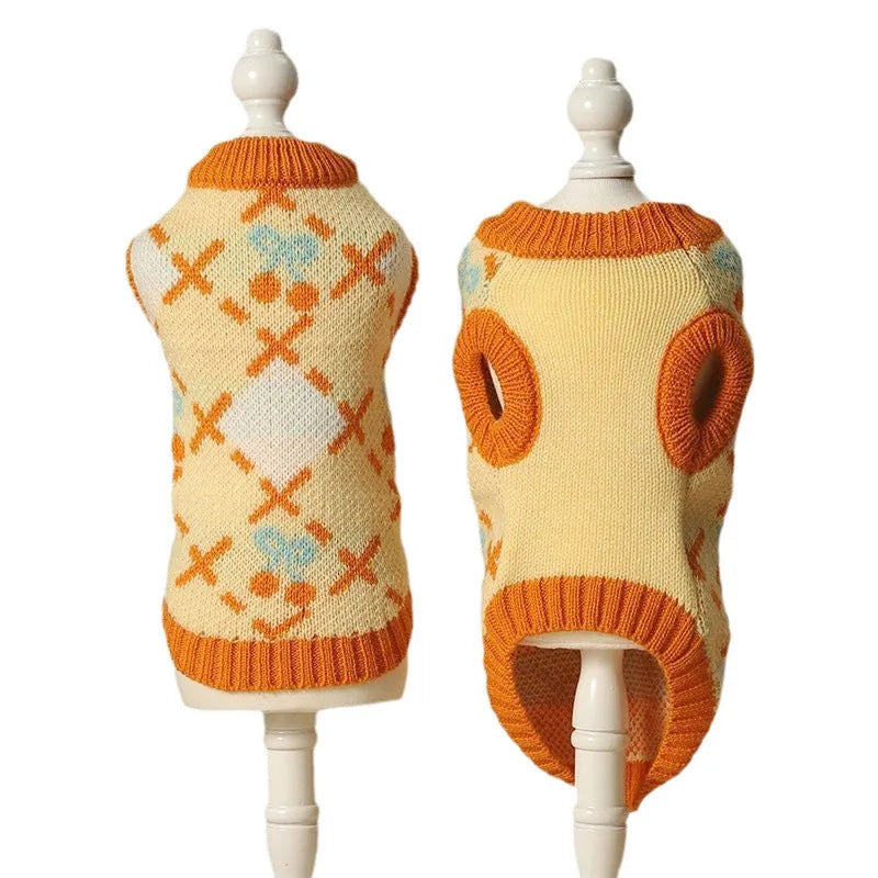 Orange knitted cat sweater with a cherry pattern, sized for small to large cats in autumn and winter.
