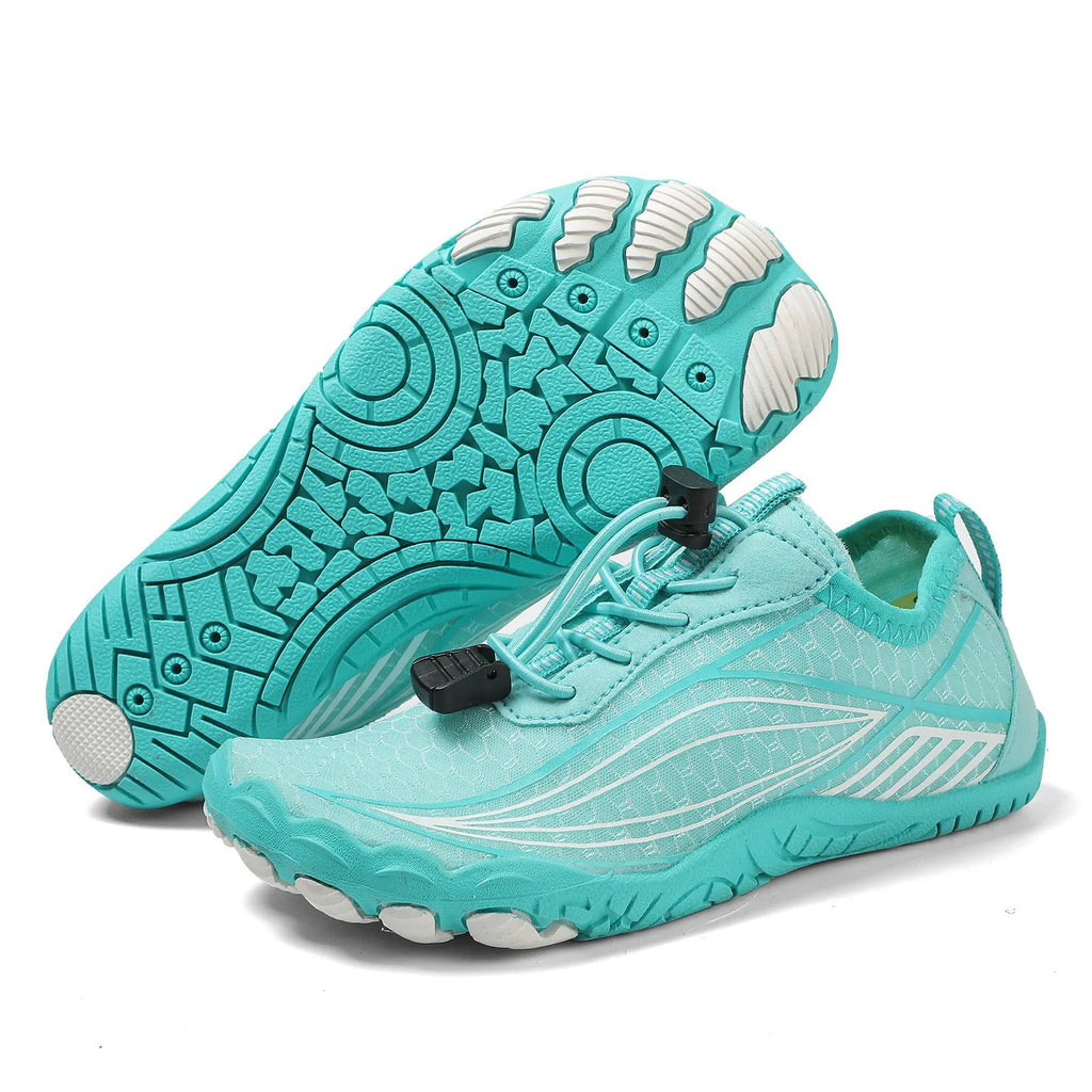 Children's black and grey quick-drying wading shoes with elastic band and rubber sole.