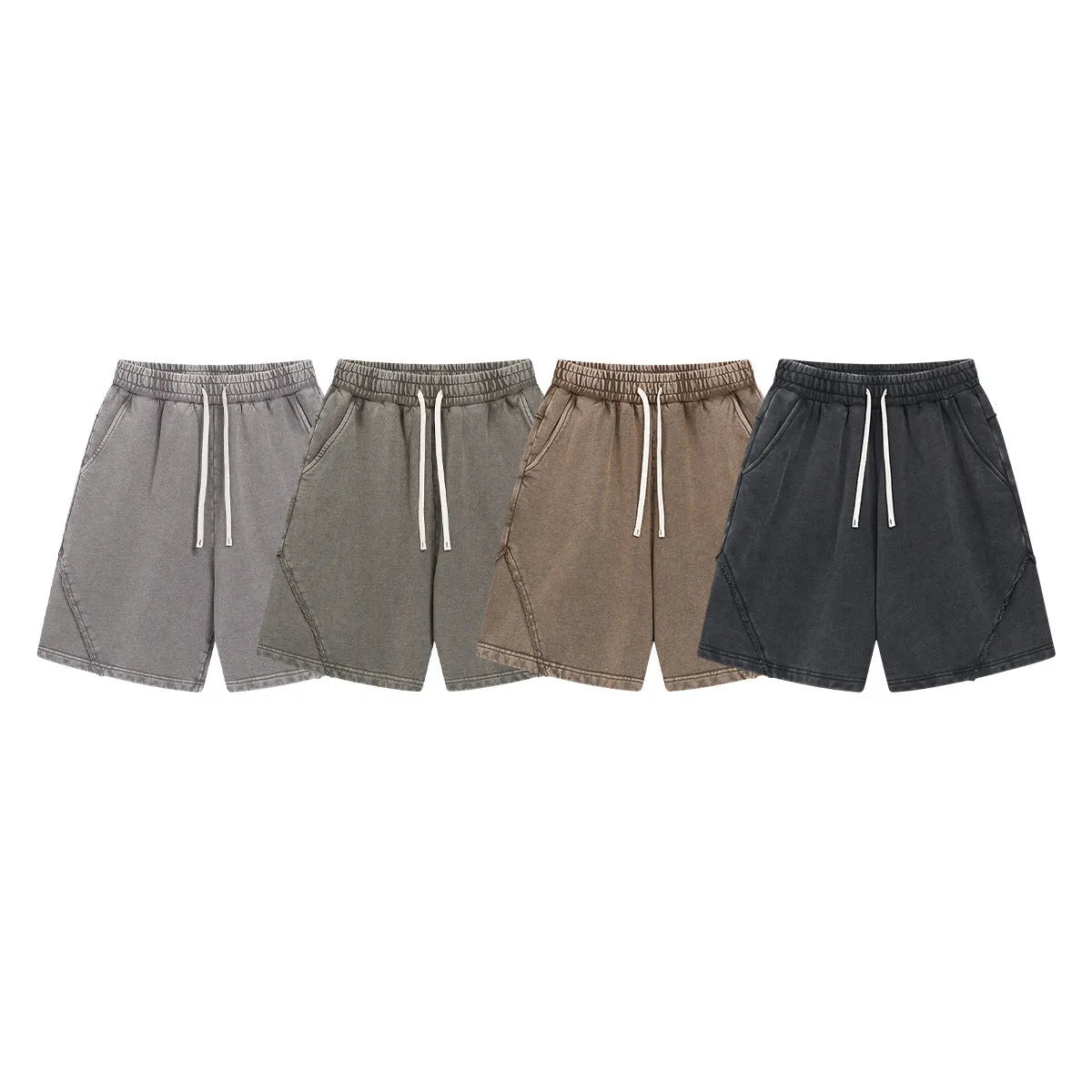 Men's loose fit retro shorts in batik washed cotton terry fabric, showing patch craft detail.