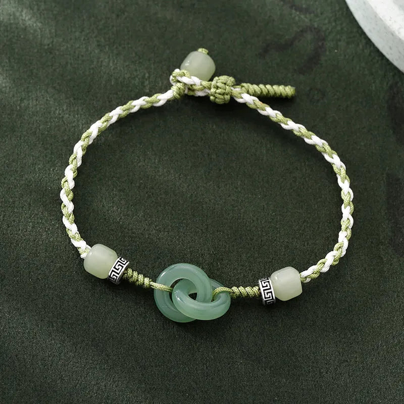 Green jade double ring strap bracelet with peace buckle and animal zodiac design in electroplated copper