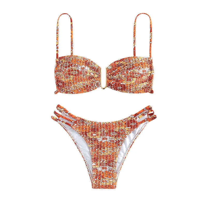 Women's floral high-waist bikini swimsuit set in solid blue colour with matching bra.