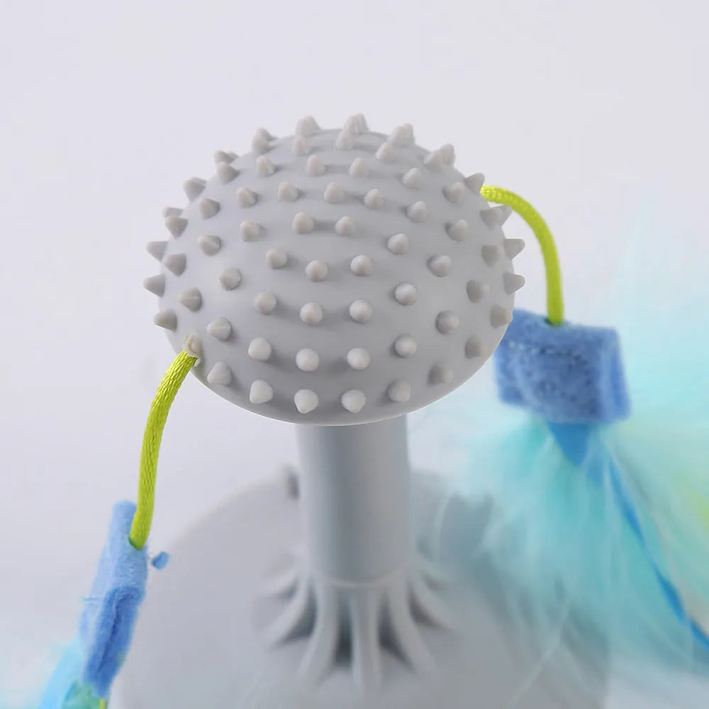 Blue plastic suction cup cat toy wand with double-haired prick head and grinding teeth section