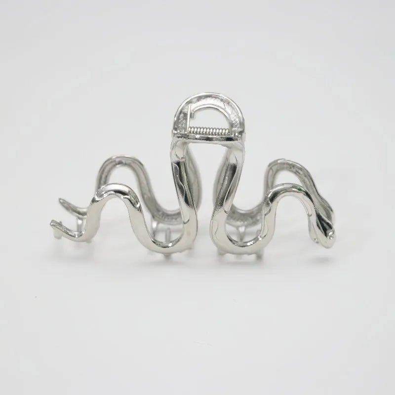 Slytherin serpentine metal hair barrette in silver or gun black, 10.5 cm long.