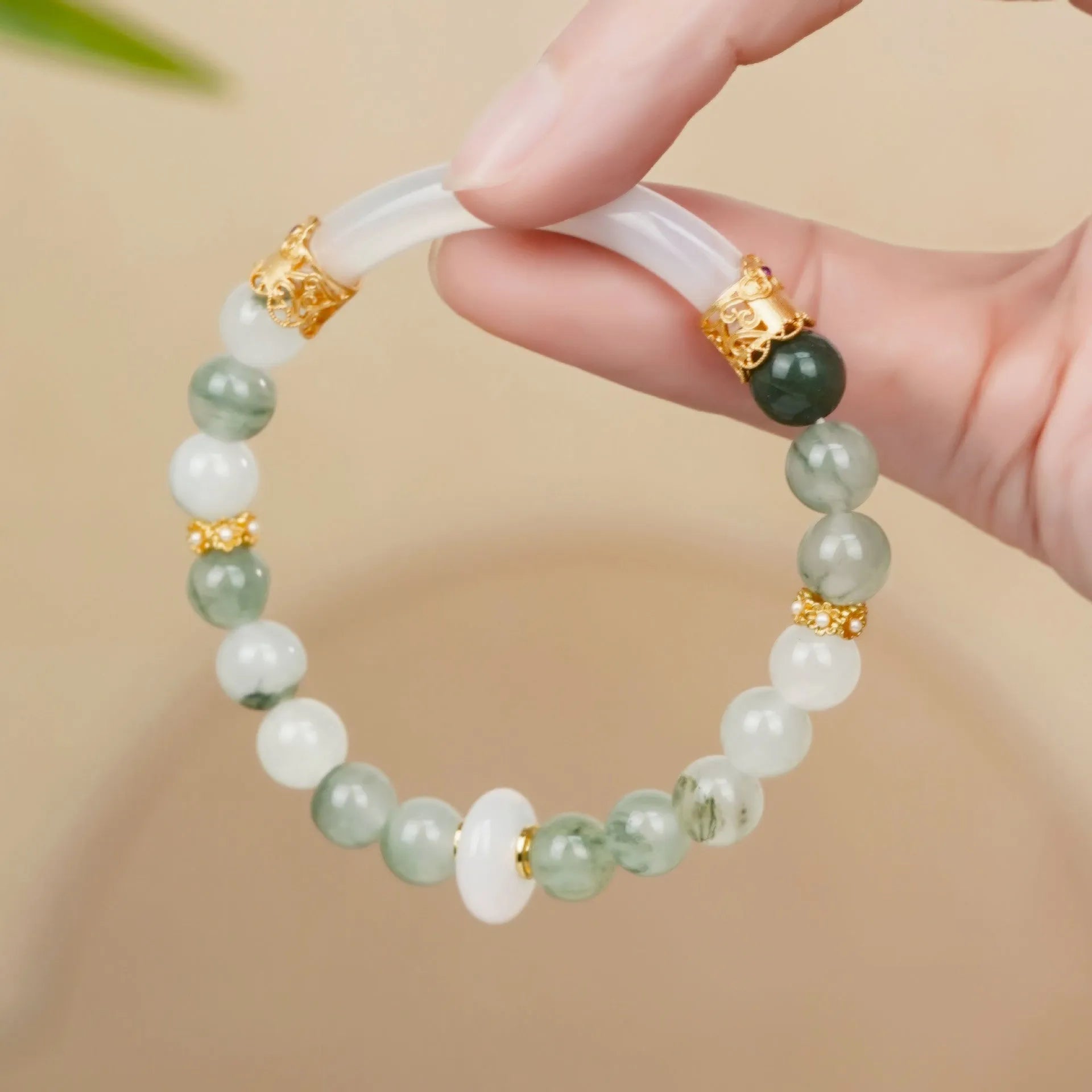 Emerald green Tian Shan jadeite half bracelet with floating flower girl design and round elements