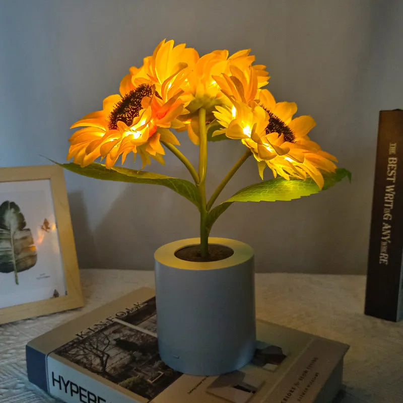 Rechargeable artificial sunflower LED night light on a table