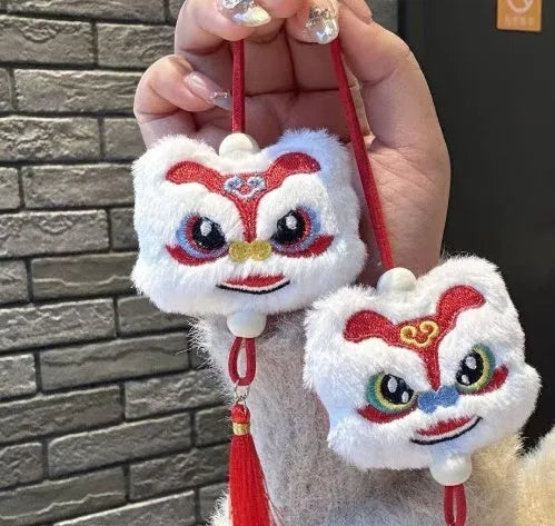 Handmade blue plush lion keychain ornament with star stone accent and embroidered cartoon features