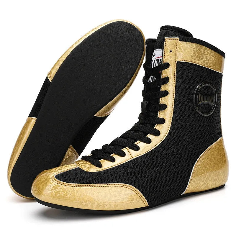Professional black and gold mesh boxing shoes with leather upper and rubber sole.