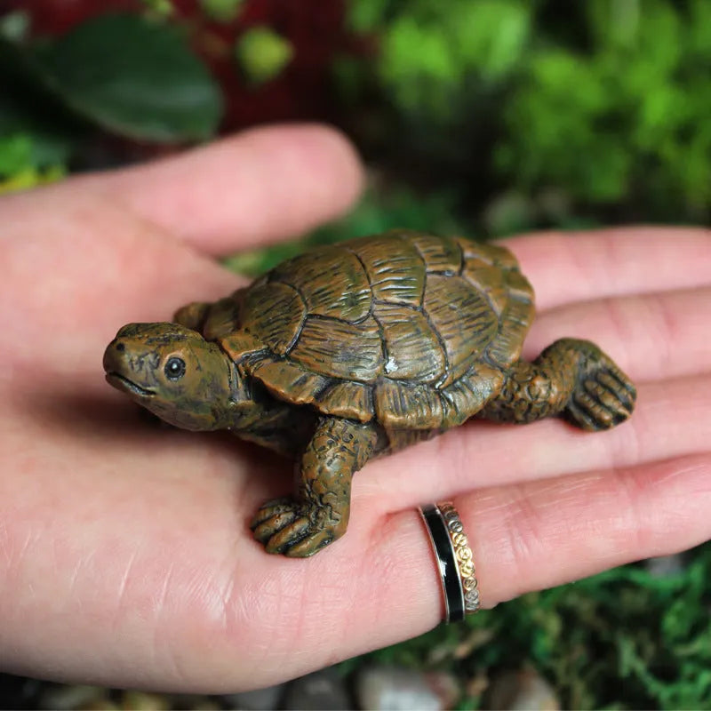 Handcrafted resin turtle garden ornament measuring 8cm long with realistic texture and pastoral style
