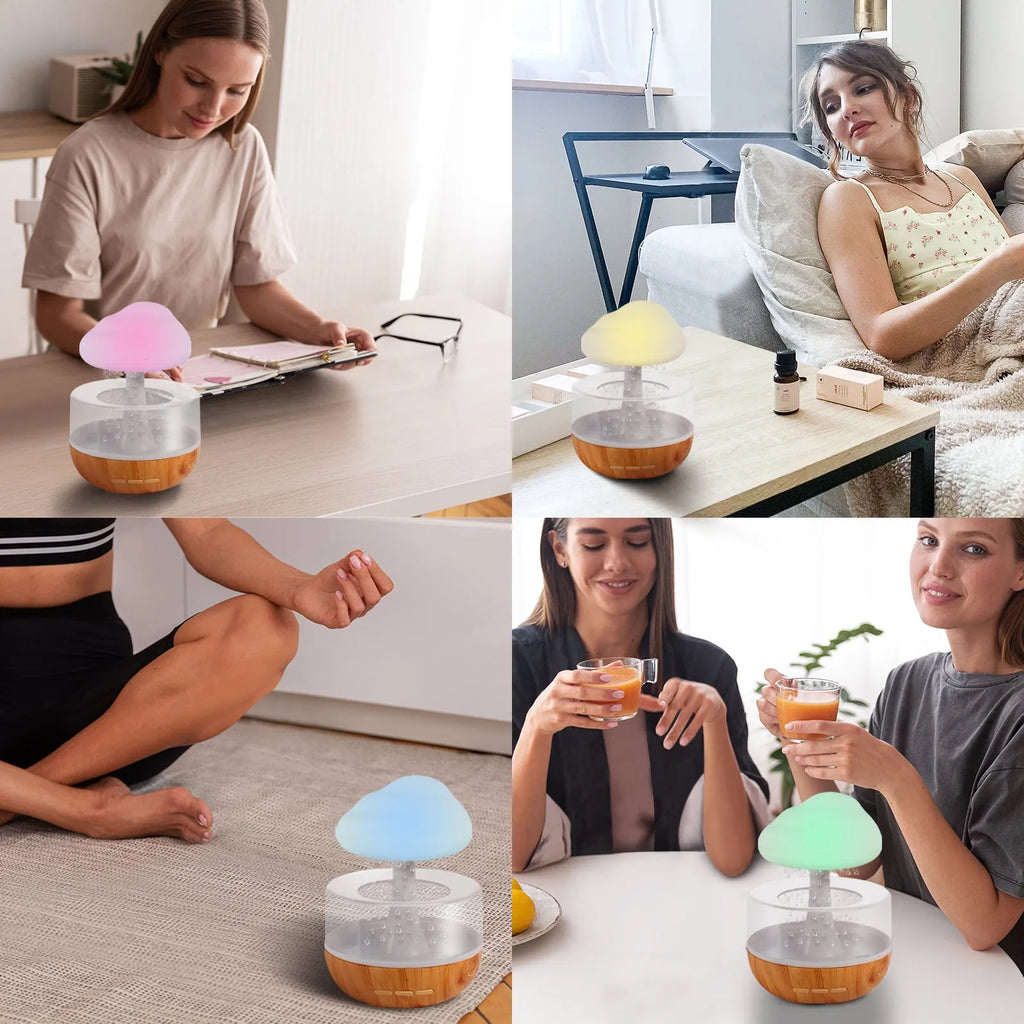 White cloud-shaped USB humidifier with 400ml tank, 7-colour LED light, and aromatherapy diffuser on a desk