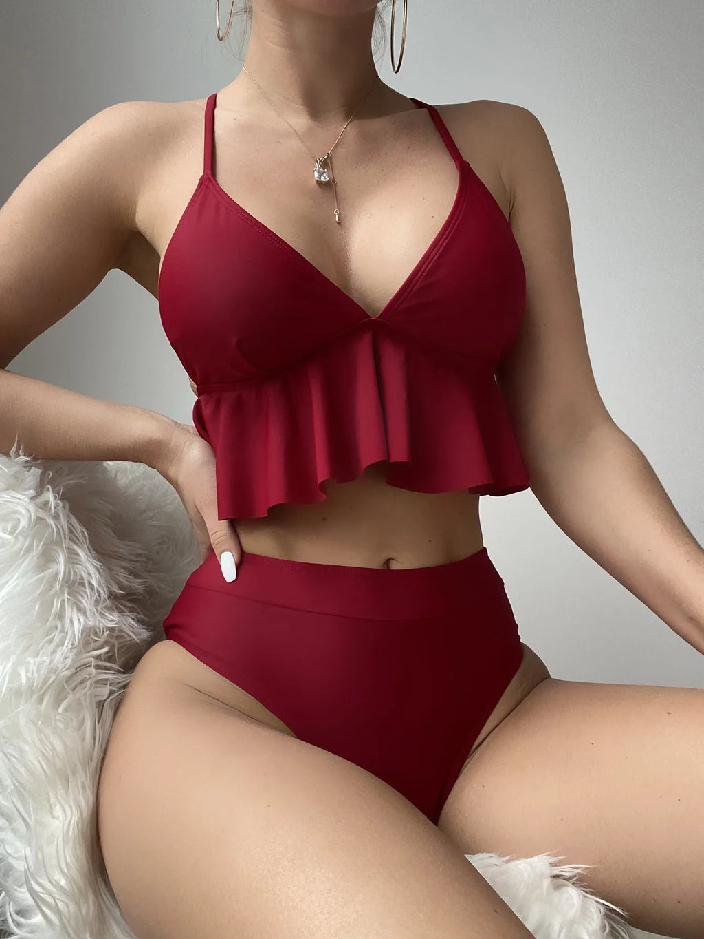 Women's solid colour split bikini swimsuit in polyester with spandex, shown in Army Green.