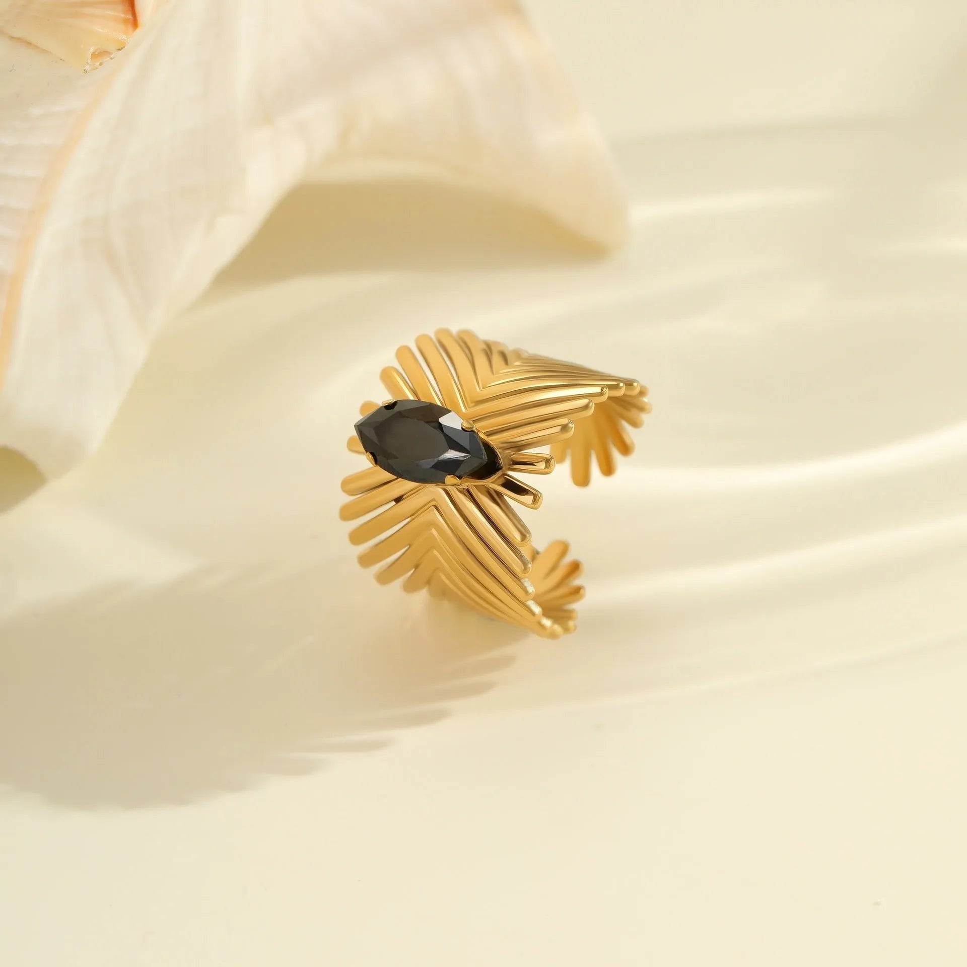 Geometric open-mouth stainless steel ring with titanium plating and inlaid zircon stones for women.
