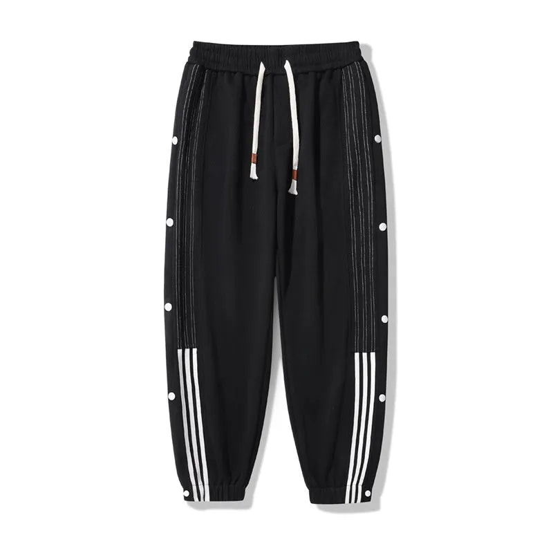 Men's ankle-tied sports pants in autumn colours with high waist and drawstring closure, sizes M to 6XL