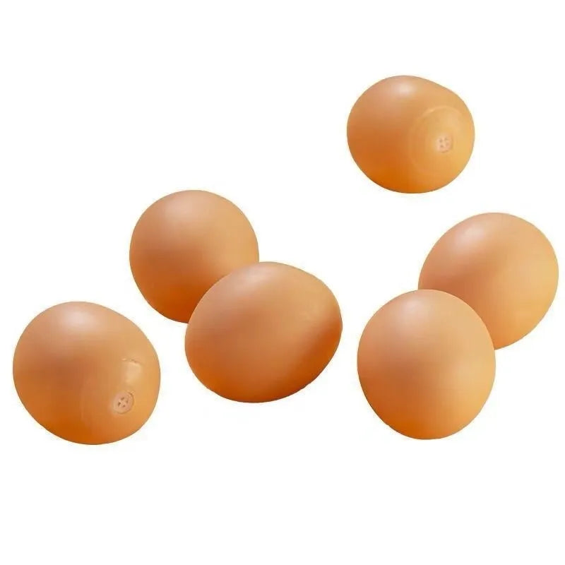 Simulation egg-shaped dog chew toy with squeaker sound for dental play
