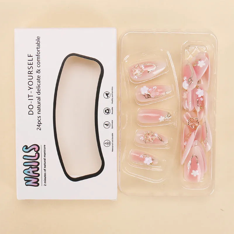 Gold silk butterfly design nail art extensions with floral and starry sky patterns, 24-piece set.