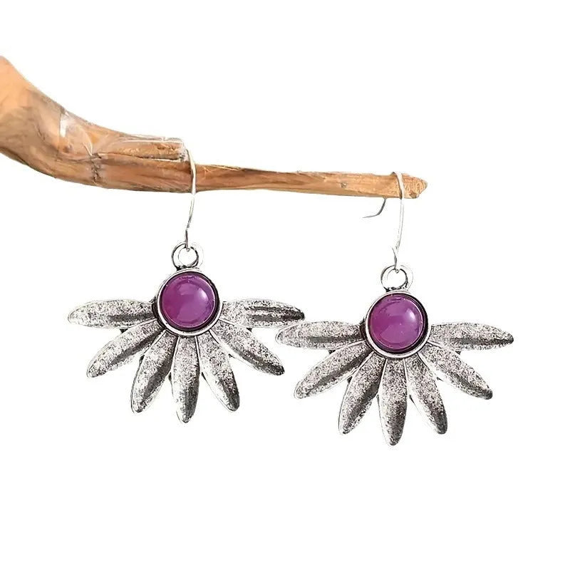 Purple resin gemstone earrings with animal/zodiac modelling in a Bohemian retro style