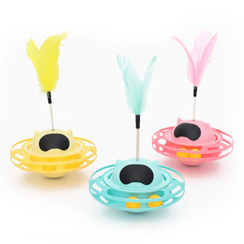 Pink rotating cat toy turntable measuring 17cm by 10cm for feline play and exercise