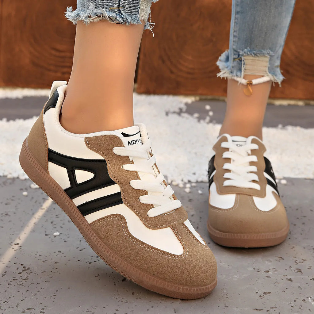 Women's retro colour matching lace-up casual trainers with a low platform heel in black, grey, or khaki.