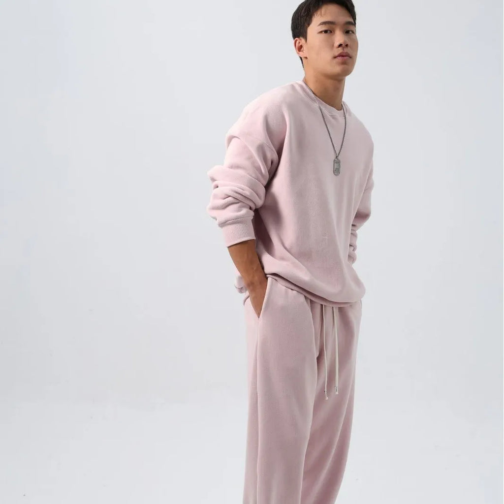 Men's black fleece sports suit with crew neck coat and loose fit trousers for winter wear