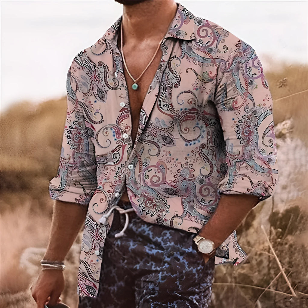 Man wearing a loose-fit long-sleeved shirt with a detailed 3D floral pattern print.
