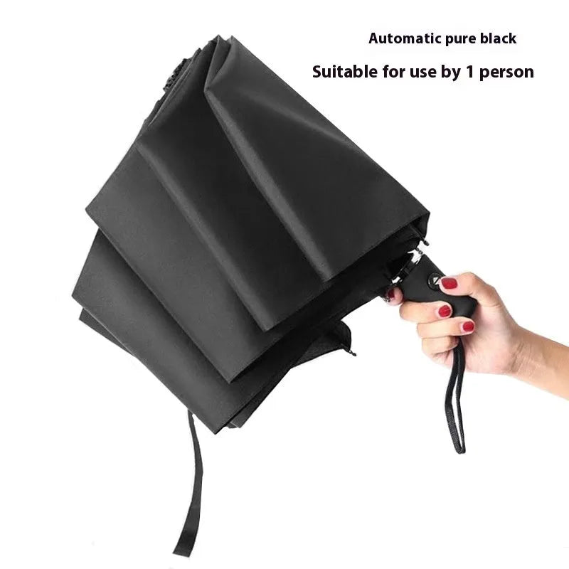 Tri-fold folding umbrella with iron frame shown in street style design with manual opening mechanism