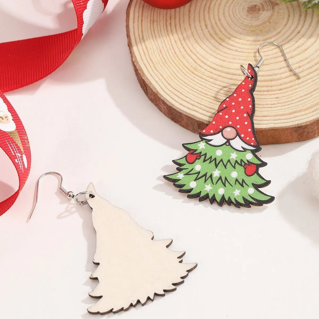 Wooden Christmas earrings with 3.5cm tree and 4cm snowman geometric shapes featuring printed festive details