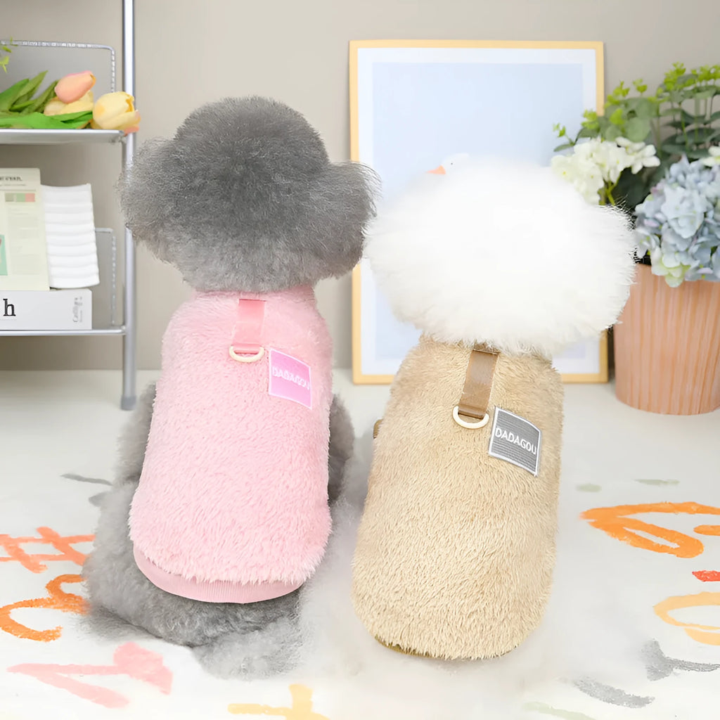 Blue coral fleece pet jacket for a dog, showing the coloured pull ring fastening.