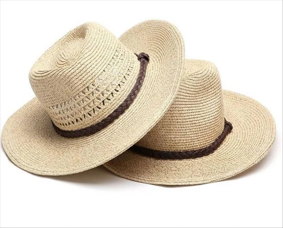 Men's foldable wide-brim straw sun hat in beige, showing its packable design.