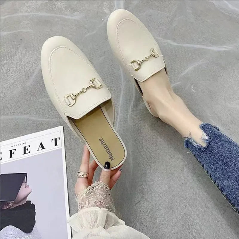 Women's PVC closed-toe slippers with buckle fastening in black, brown or white colours