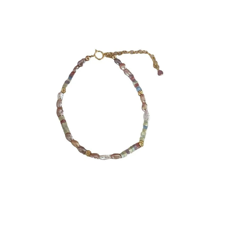 Handcrafted natural pearl bracelet and necklace set with 14K gold-plated finish and U-shaped design