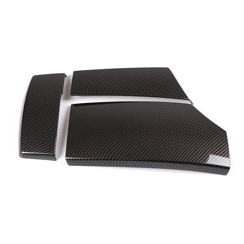 Three ABS carbon fibre pattern armrest covers showing diagonal weave texture and polished surface