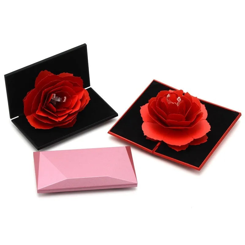 Rotating heart-shaped ring box with 3D rose decoration in red colour