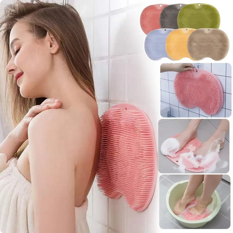 Orange massage bath brush with suction cups and silicone bristles on a 23x30cm TPR mat