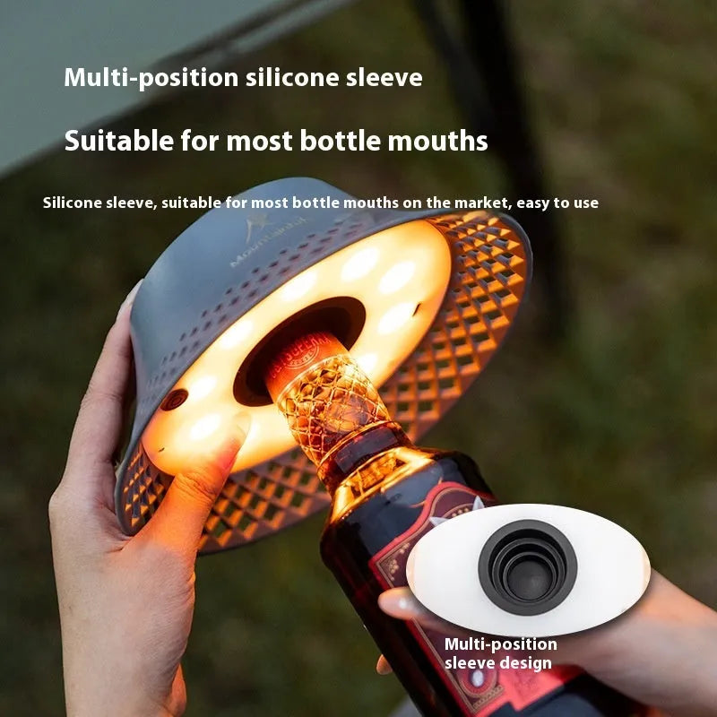 Beige wine bottle-shaped camping lantern with LED lights and USB Type-C port for charging