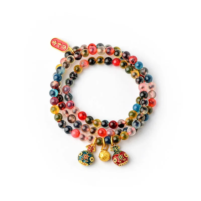 Handmade Dzogchen Agate bracelet with Sugar Heart Fragrant Gray glaze and Swallowing Gold Beast detail.