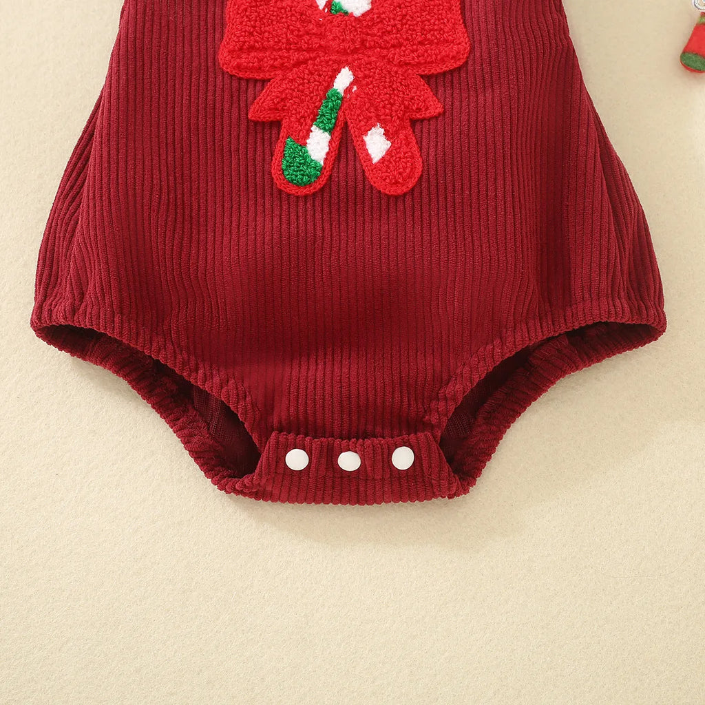Red sleeveless cotton triangle romper for babies and toddlers with embroidered wing detail, shown in 70cm to 100cm sizes