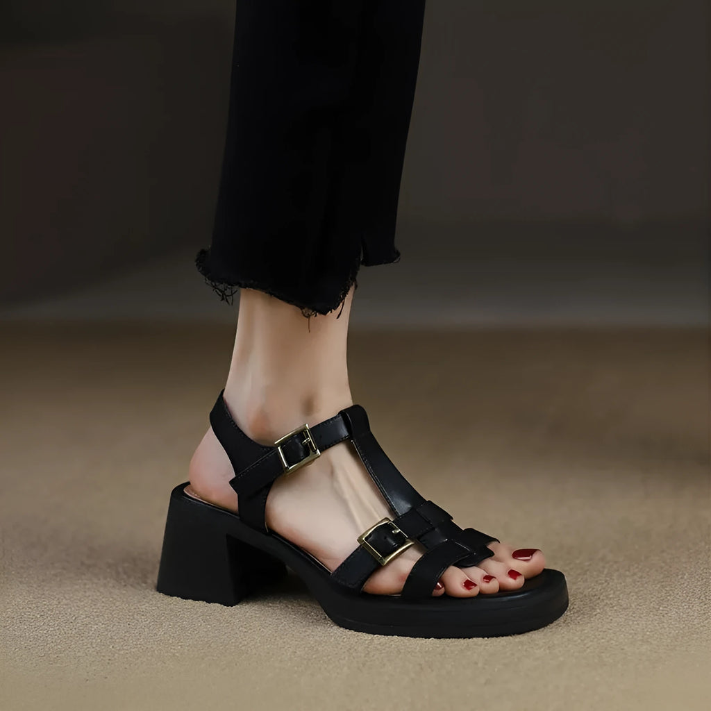 Women's black platform heel sandals with T-buckle ankle strap and open square toe design