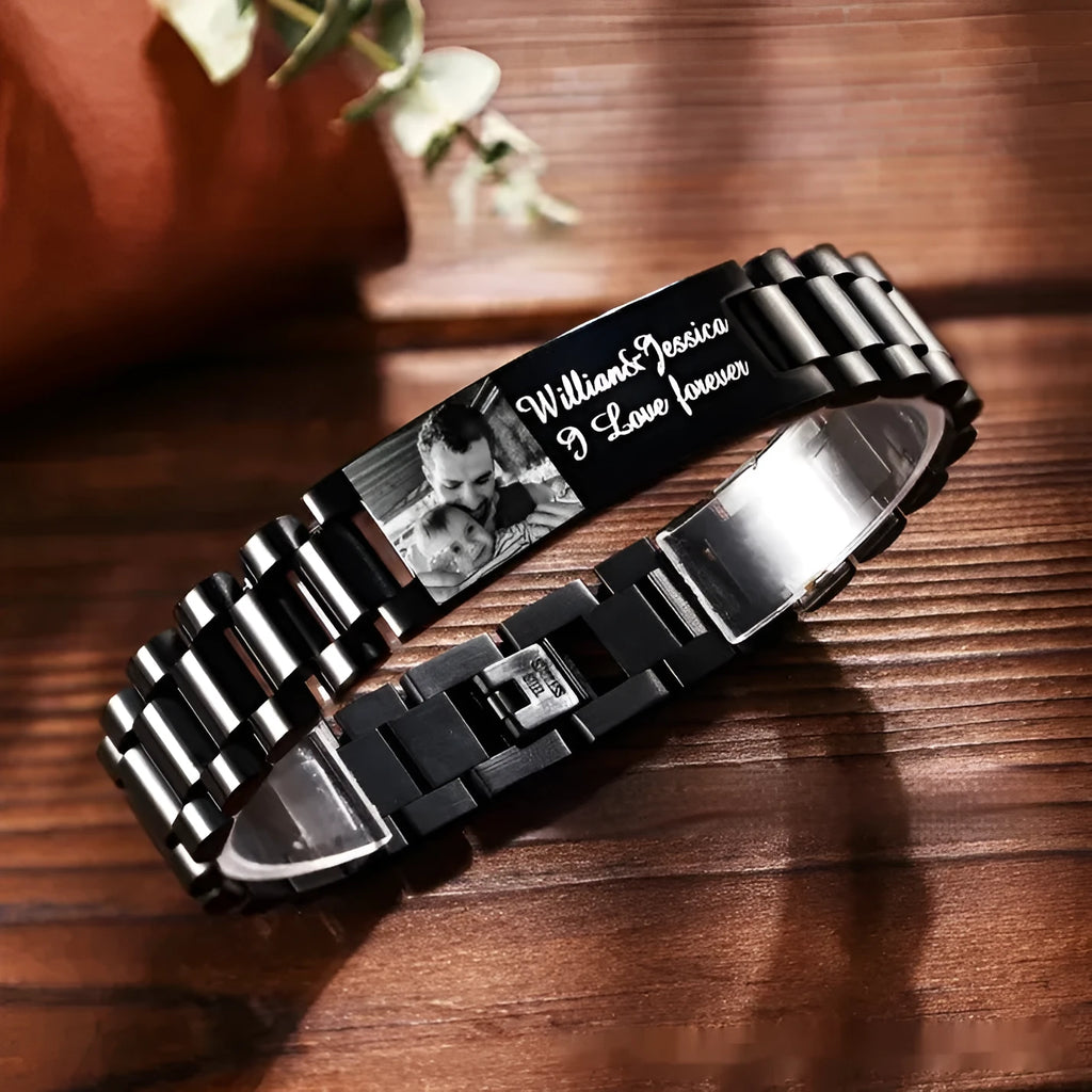 Titanium steel heart-shaped bracelet with black lettering on a curved band.