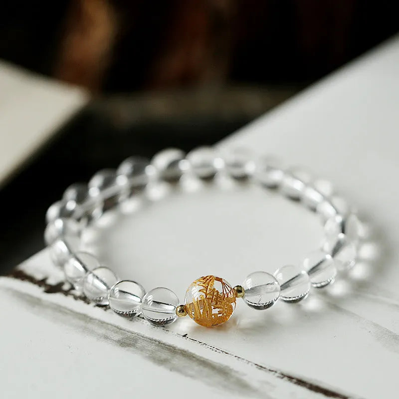 Unisex geometric obsidian and white crystal bracelet with black agate beads and golden dragon accent