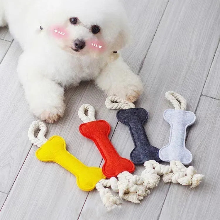 Bone-shaped dog toy with rope knots in felt construction, measuring 16cm by 7cm