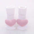Baby floor socks in cotton with breathable fabric, showing size options XS S M and design variations including bows and animal prints