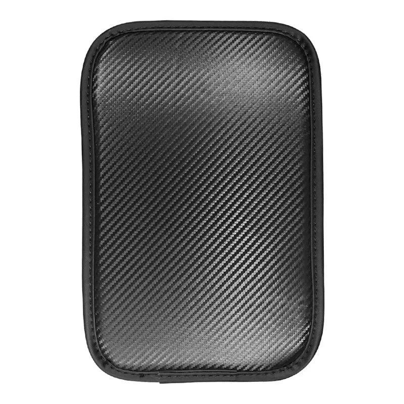 Leather car armrest cushion in black, khaki, red, and white colours, shown on a car centre console.