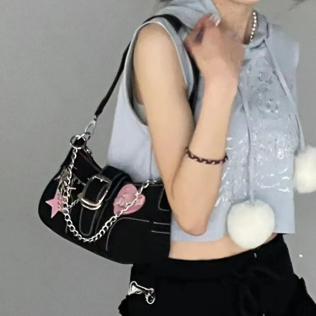 Black PU shoulder bag with bow, stitching and chain details, 25cm x 13cm x 7cm