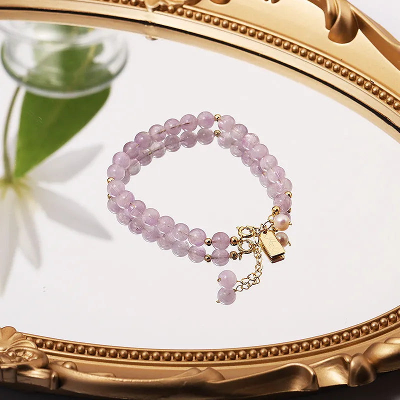 Natural lavender amethyst crystal bracelet with zodiac motifs and adjustable clasp in light or dark colour options