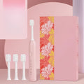 Yellow duck designed rechargeable electric toothbrush with USB port and soft bristle head.