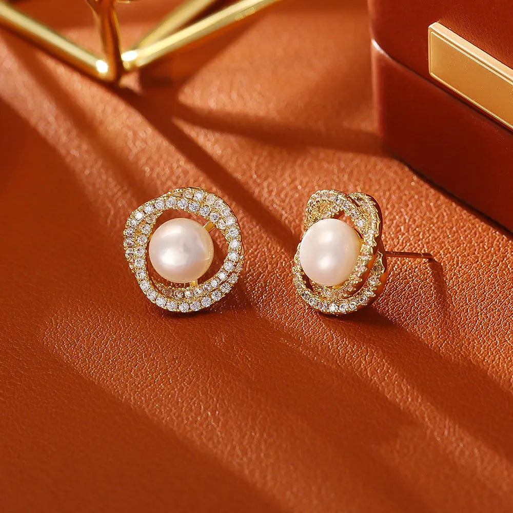 Glass pearl stud earrings with real gold plated copper, geometric round shape, shown in purple, champagne gold, gold, and silver.