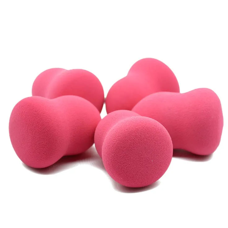 Pink hydrophilic non-latex makeup sponge measuring 4x4x5.6 cm with soft Q elastic texture for foundation application.