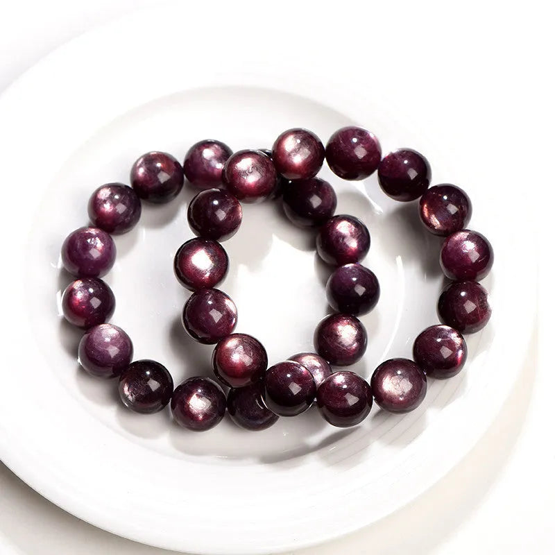 Purple lepidolite crystal bead bracelet with polished round beads in natural colour, showing size options from 6mm to 15mm diameters