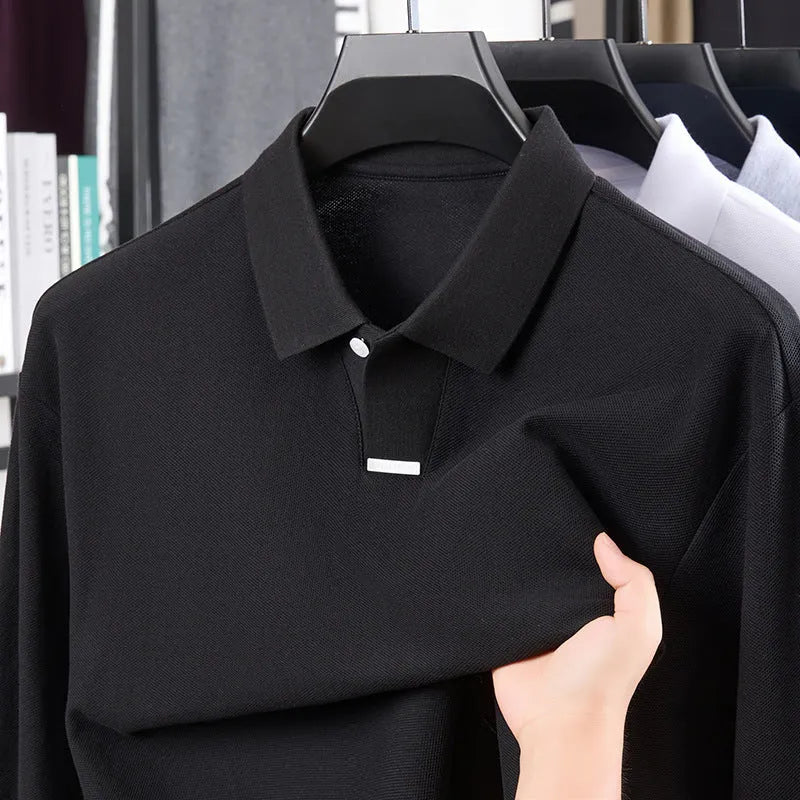 Men's grey cotton polo shirt with asymmetric lapels and long sleeves, showing loose fit design